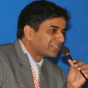 Dr. Shiv Menon